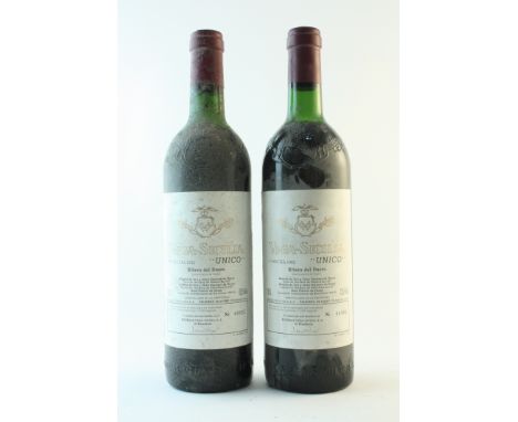 Vega-Sicilia Unico 1962 Ribera del Duero(1 high, 1 high mid shoulder; bin-soiled &amp; nicked labels; 1 nicked capsule)2 bott