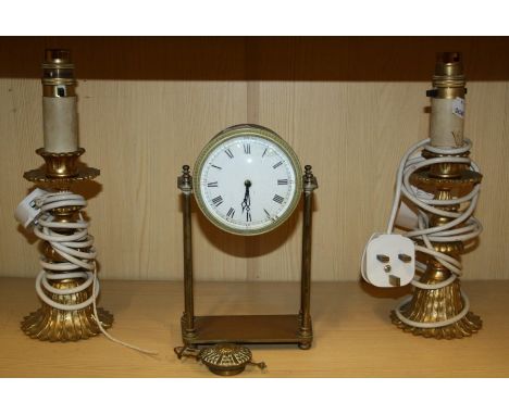 A pair of gilt metal squat candlesticks table lamps with acanthus decoration, together with a late 19th century brass cased p