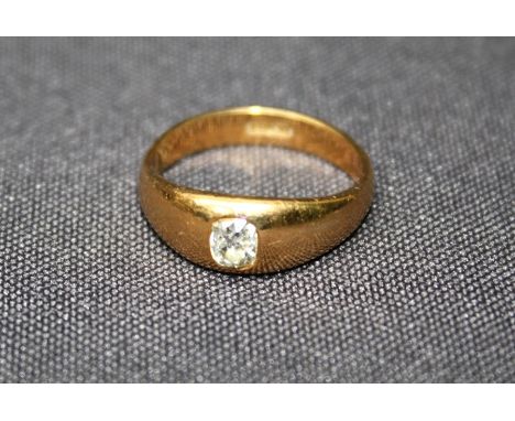 An 18ct yellow gold Gypsy set gents ring with mine cut diamond. 5gm gross weight