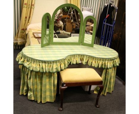 A large chintz draped kidney shaped dressing table and stool. Together with a painted triptytch mirror. 170cm wide  Formally 