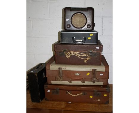 Three vintage suitcases, a Brother De Luxe 1510 typewriter, a case of HMV gramophone records and a bakelite cased Bush radio