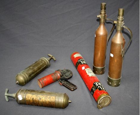 A collection of vintage fire extinguishers, to include two vintage 'Pyrene' and two 'Teletetra' extinguishers and Kya Fyre an