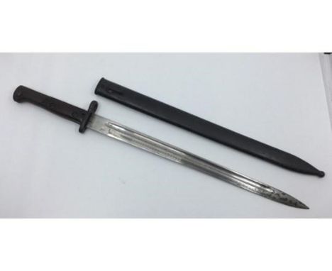 Czech VZ24 Bayonet. 38cm long fullered single edged blade. Overall length 515mm. Number to pommel 14693. Wooden grips. Comple