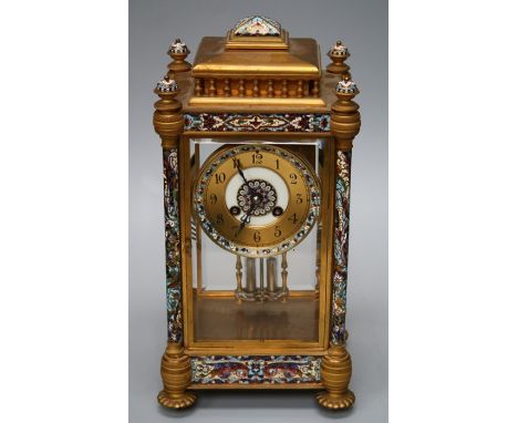 A late 19th century Champleve and gilt brass four glass, eight day mantle clock with faux mercury compensating pendulum and c