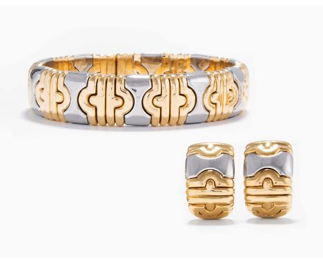 Bulgari "Parentesi" Armspange/Ohrlicps750 Gelbgold/Edelstahl. Signiert. Armspange Innenumfang 16 cm flexibel, 6x5 cm, B 1,4 c