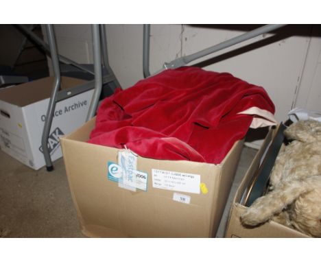 A box containing velvet curtains 