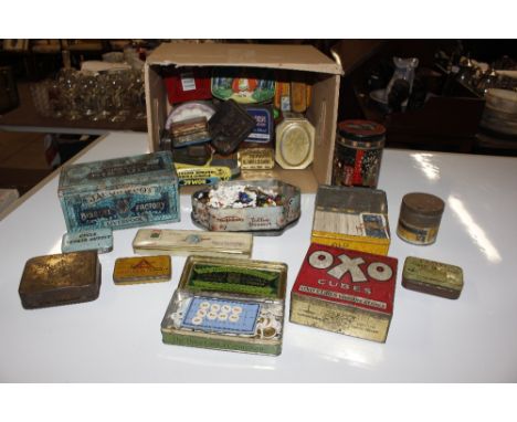 A box of various vintage tins, some containing various collectors cards, beads etc.