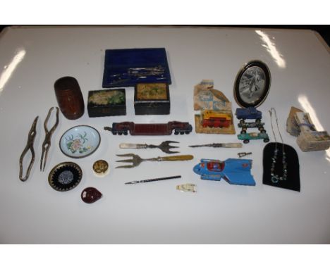 A box containing various miscellaneous items to include a Corgi Super Mobile, various other ide-cast vehicles, decorative tri