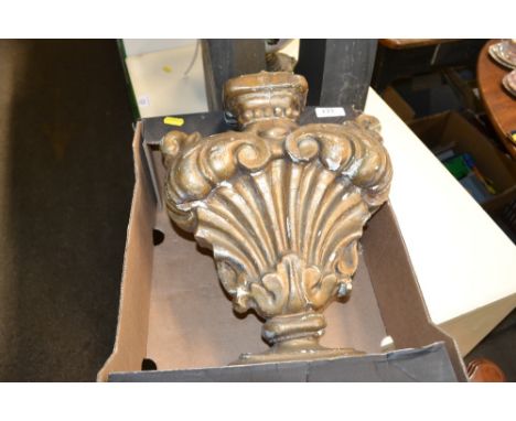 A carved wooden gilded lamp base 