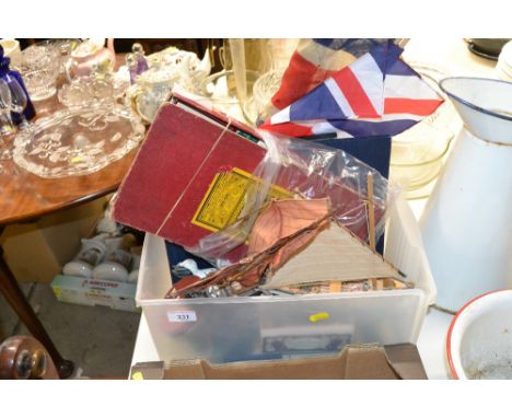 A box of various sundry items to include model boats; jigsaw puzzles; painted figures; vintage Union Jack; part set of Cutty 