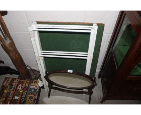 A folding card table; a folding towel rail and a swing framed mirror 