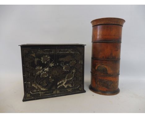 A treen four section spice pot and a toleware tea caddy. 