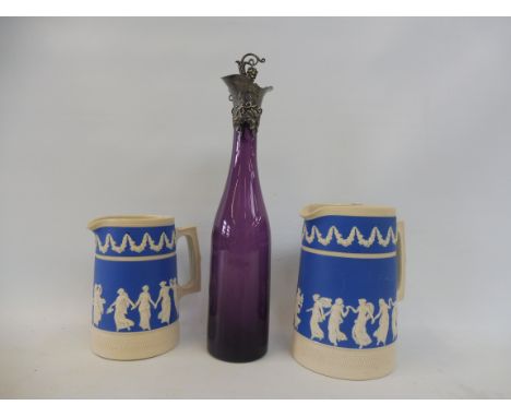 An amethyst coloured glass decanter with silver mount, 11 3/4" h plus a graduated pair of Copeland Late Spode blue and white 