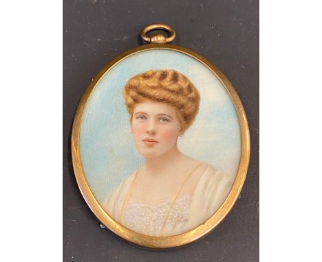 An oval portrait miniature, probably on ivory, of a lady.