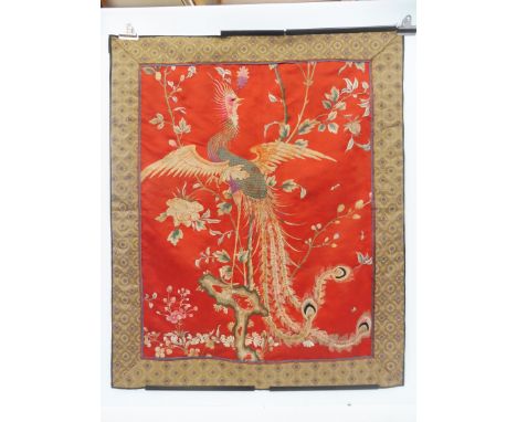 A Chinese embroidered silk wall hanging panel depicting a bird of paradise, 31 3/4 x 38 1/2".