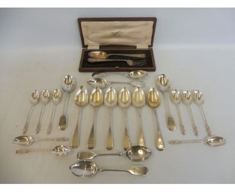 A set of six silver teaspoons, Exeter 1866, a set of six Georgian silver teaspoons, London 1822, and nine silver apostle spoo