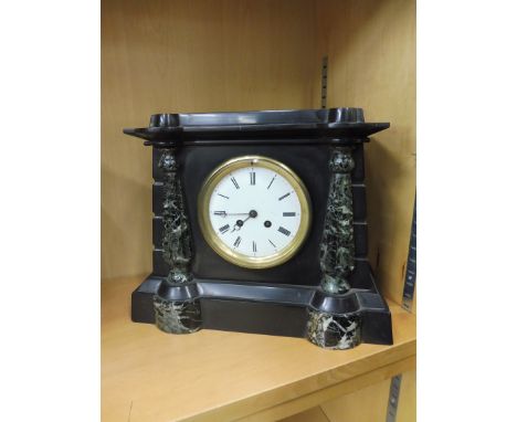 A late Victorian slate and marble embellished mantle clock, with circular white enamel dial, 14 1/2" w x 11 1/2" h x 7" d.