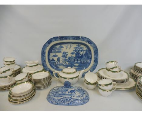 An early/mid 19th Century blue and white meat platter, willow pattern, 19 x 14" plus a 19th Century blue and white tureen lid