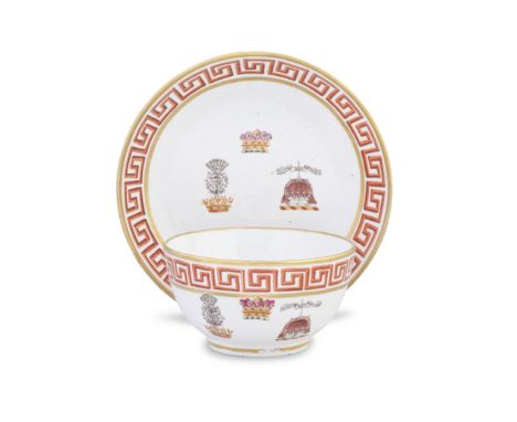 A Coalport breakfast cup and saucer from the Reverend William Nelson service, circa 1806-08The large cup and plain dished sau