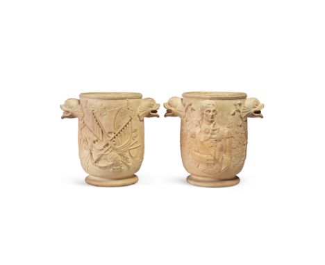 An impressive pair of Davenport terracotta wine coolers, circa 1800-1810Moulded in high relief with a handsome half-length po