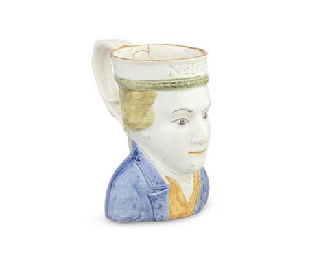 A Prattware Nelson mug, circa 1800Modelled in the form of the Admiral's head and shoulders, picked out in colours, the rim im