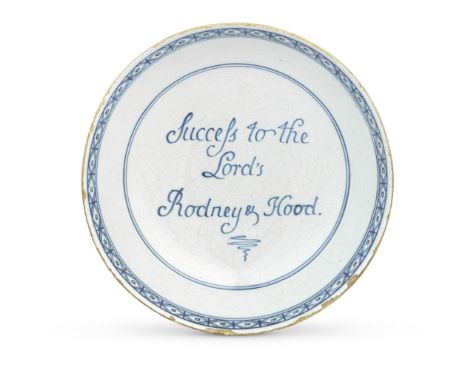 A good English delftware bowl, circa 1780The interior inscribed in blue 'Success to the Lord's Rodney &amp; Hood' above a flo