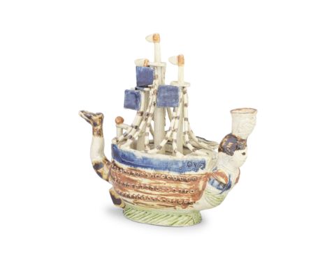 HMS Royal George: a rare novelty Prattware pipe, circa 1782-1800Modelled as a ship of the line with three decks complete with