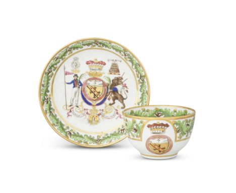 Another Coalport breakfast cup and saucer from the 'Nelson Set Tea Service', circa 1802The large cup with a border of oak lea