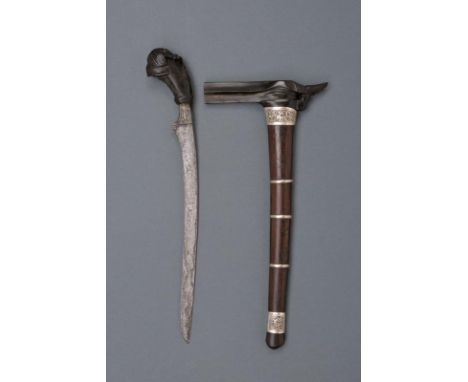 dating: first quarter of the 20th Century provenance: Sumatra, Simple, single-edged blade in pamor; wooden hilt embossed with