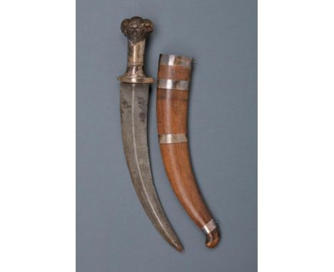 dating: 19th Century provenance: Indonesia, Strong, curved, double-edged blade, ribbed in the center; horn hilt embossed with