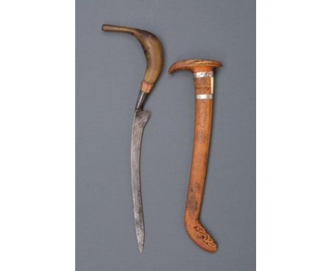 dating: 20th Century provenance: Sumatra, Curved, single-edged blade; typical, strongly angled, horn grip with metal ring-nut