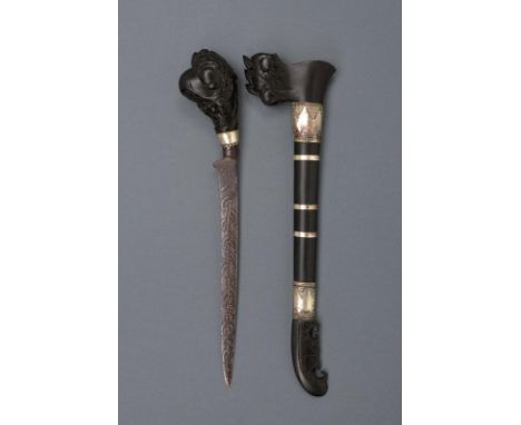 dating: first quarter of the 20th Century provenance: Sumatra, Single-edged blade, engraved with curls; ebony grip, richly en