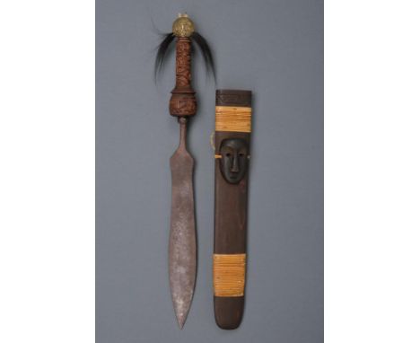 dating: Late 19th Century provenance: Borneo, Wide, double-edged blade decorated with floral engravings; wooden grip, richly 