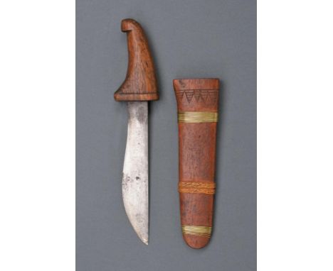 dating: 20th Century provenance: Indonesia, Wide, curved, single-edged blade. Wooden grip. Wooden scabbard with vegetable and