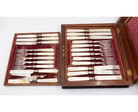 A matched Victorian silver plate and mother-of-pearl mounted set of eighteen fruit knives and forks (1 fork missing), the maj