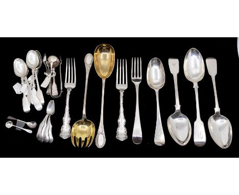 A collection of silver flatware to include: 3 x 19th Century fiddle pattern table spoons; George II Hanoverian table spoon; G