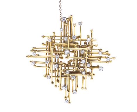 A Modernist 18ct gold and diamond pendant/brooch, comprising interwoven layers of round wire with bead terminals scattered wi