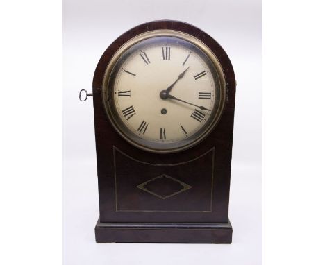 A Victorian single fusee round top mantel clock with 7" white round dial and cast bezel. Contained in a mahogany veneered  ca