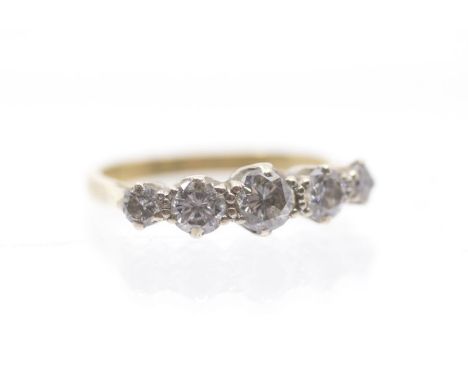 A five stone diamond and 18ct gold ring, comprising five graduated round brilliant cut diamonds, combined total diamond weigh