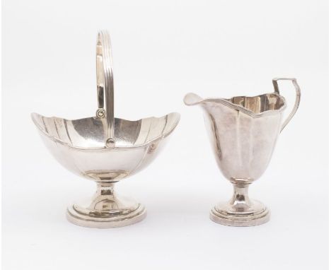 *** PLEASE NOTE THE MARKS ARE JAPANESE AND NOTE CHINESE AS PREVIOUSLY DESCRIBED:***A Japanese Export silver milk jug and swin