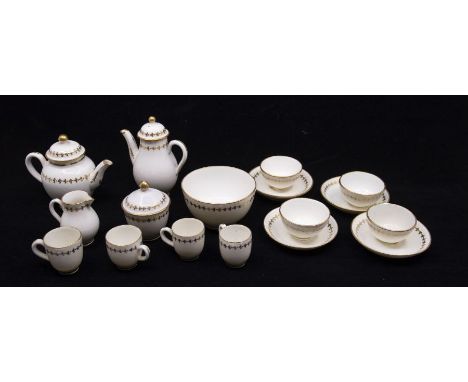 *** PLEASE NOTE this is CAUGHLEY ******A 19th century porcelain miniature tea set, comprising teapot, coffee pot, four tea bo