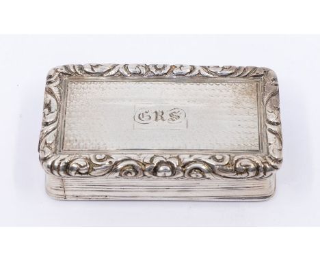 A George III silver snuff box, with cast scrolling flower and foliate border above reeded sides, the base with engraved baske