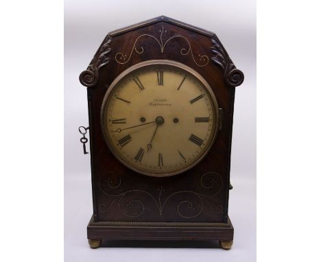 Elleby Ashbourne Derbyshire 8 day twin fusee mantel clock striking on a bell. 8 " white dial with cast bezel moon hands. 8 da