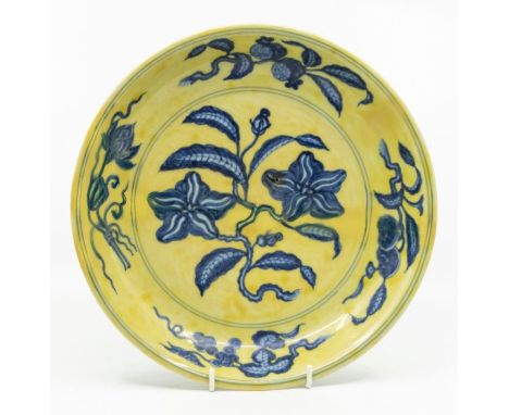 Perhaps Chinese Ming Dynasty; an Imperial made Chinese under glaze, blue yellow ground dish/saucer, possibly Hongzhi (1488-15