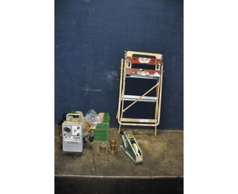 A TRAY CONTAINING TOOLS AND A SMALL FOLDING WORK BENCH including a Knight Taylor KT150 petrol battery charger (engine pulls f