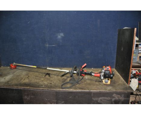 A DANARM VS256 PETROL STRIMMER with Mitsubishi TU26 engine total length 180cm (engine starts and runs)