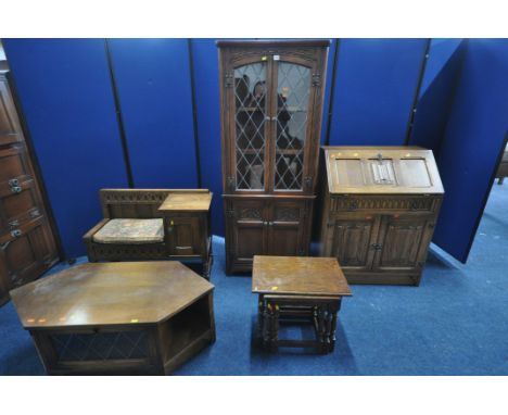 A SELECTION OF 20TH CENTURY OAK FURNITURE, to include an Old Charm corner cupboard, with double lead glazed doors and double 