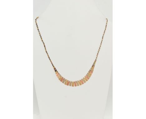 A 9CT GOLD CLEOPATRA STYLE NECKLACE, a tri colour necklace comprised of graduated rectangular form panels, polished finish to