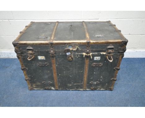 A VICTORIAN CANVAS TRAVELLING TRUNK, could be upcycled to be used as a coffee table, width 100cm x depth 58cm x height 66cm (