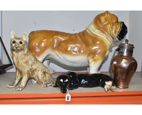 A GROUP OF CERAMIC DOGS, comprising two Winstanley dogs comprising an Alsatian and Dachshund, a large ceramic Bulldog, height